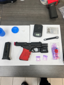 Traffic stop leads to drug, weapons charge in city